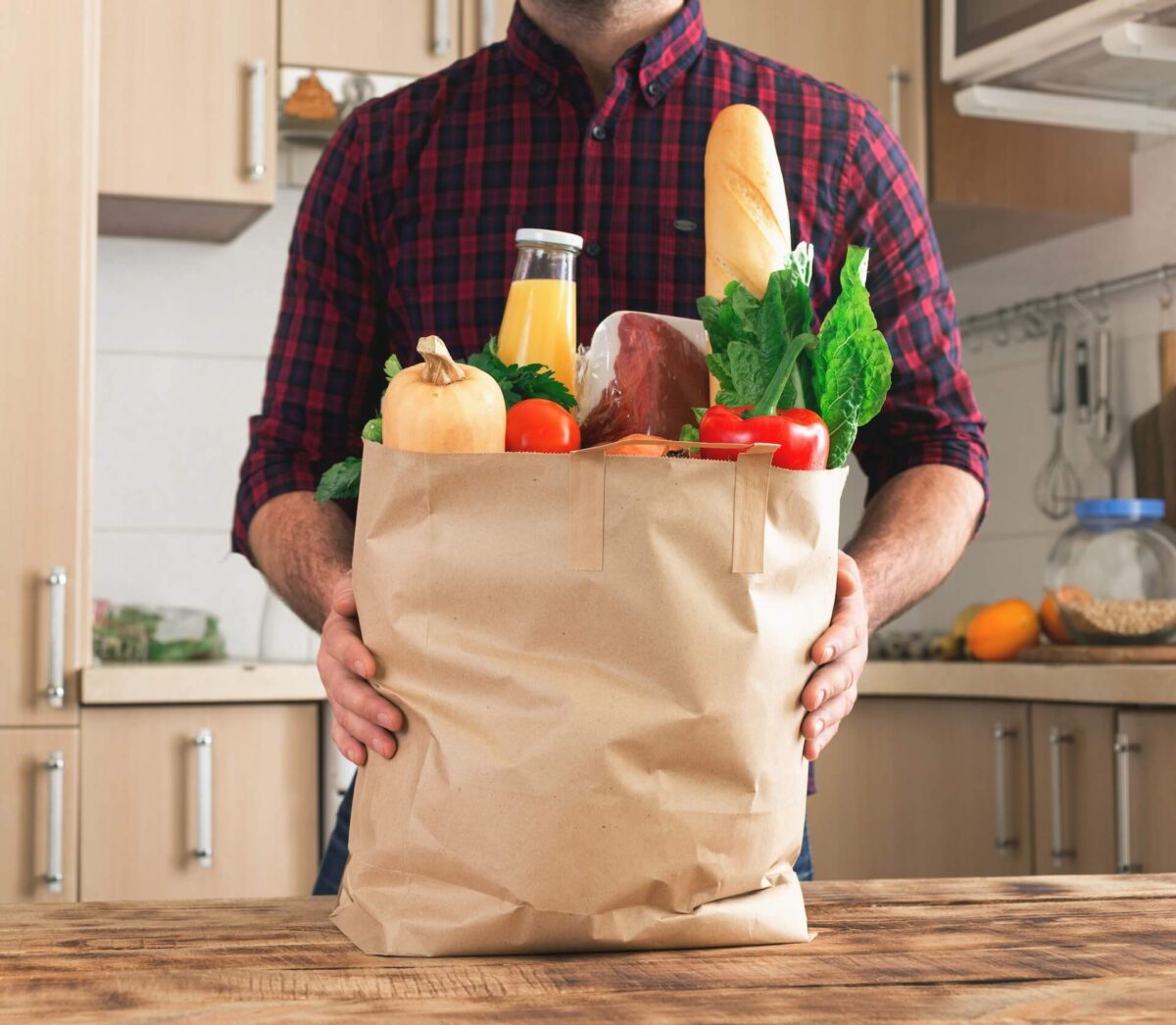 A man with a grocery bag