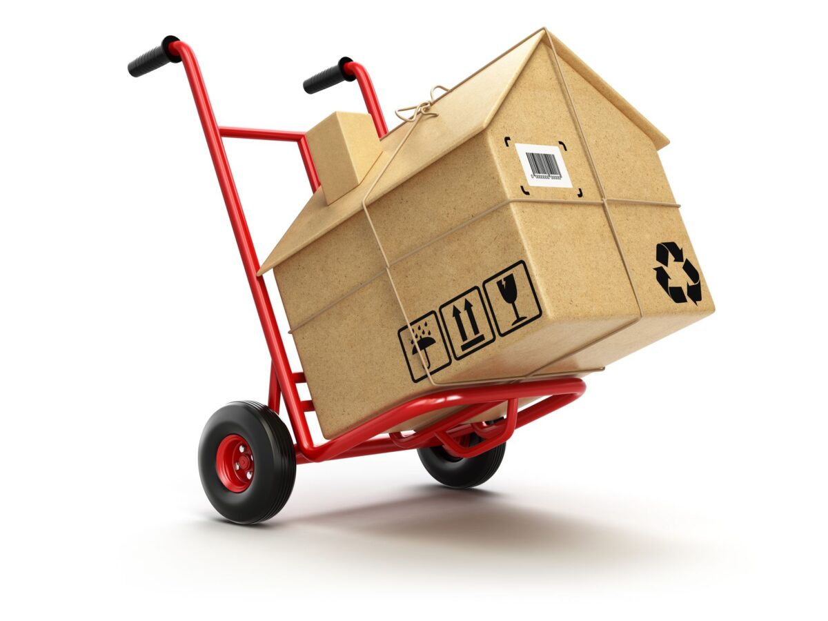 A utility dolly with a box that is shaped like a house