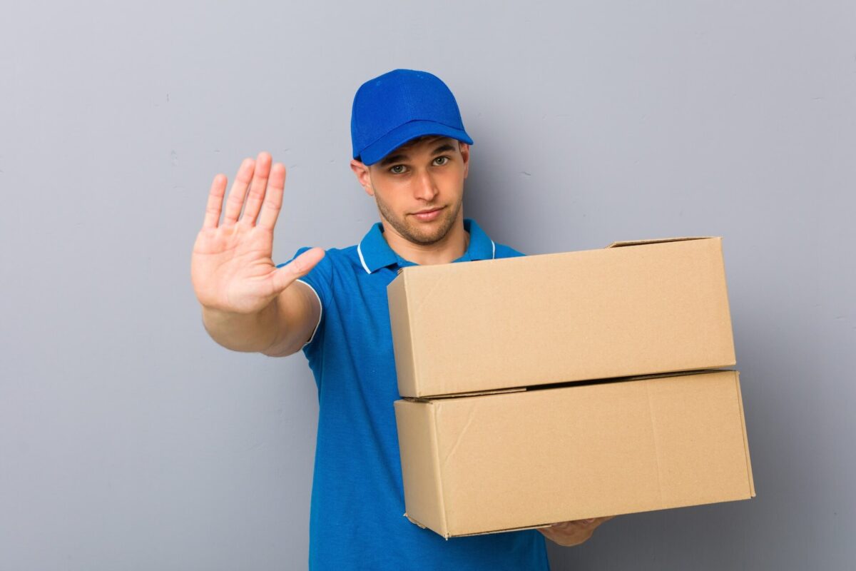 A mover holding a box
