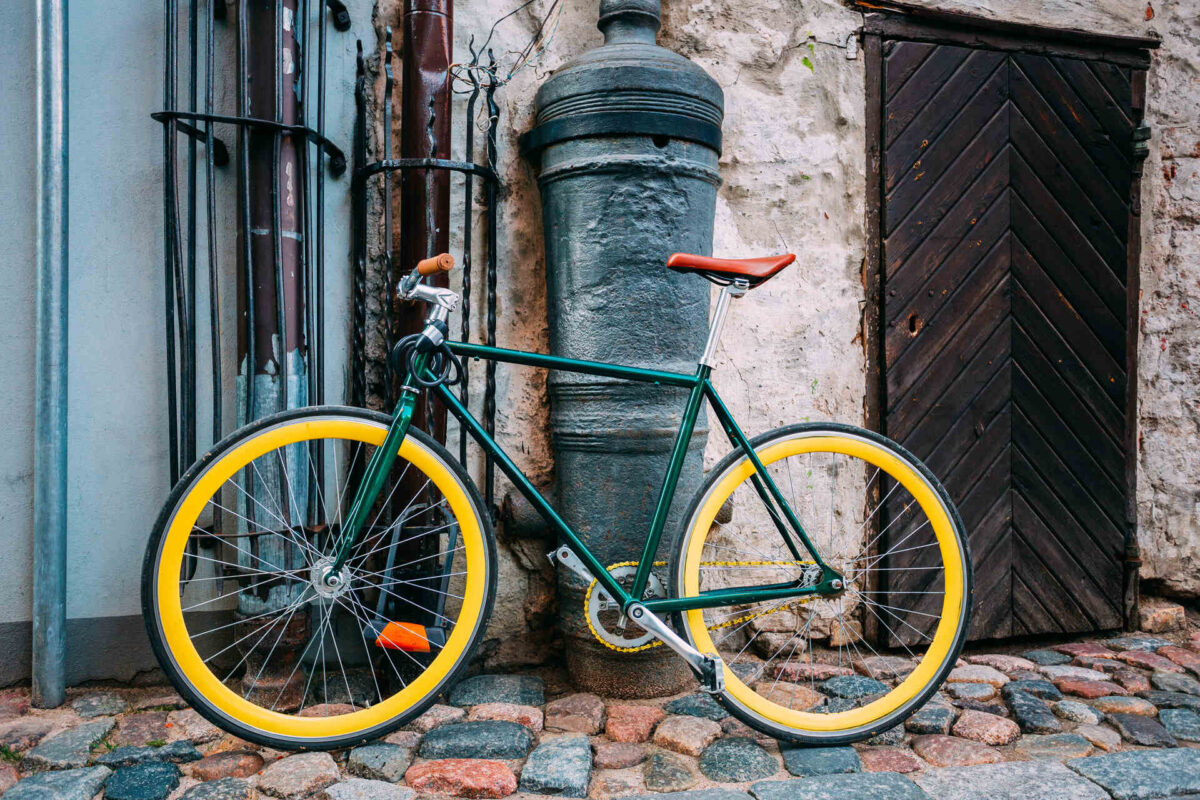 A green bicycle on the wall