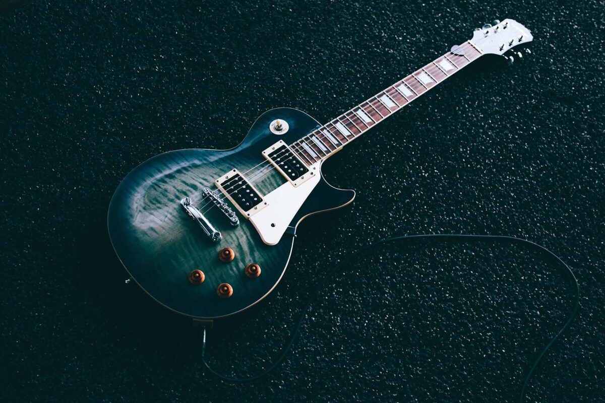 Guitar lying flat on the floor