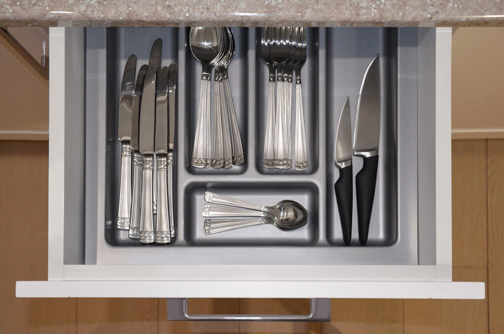 Cutlery stacked after moving overseas