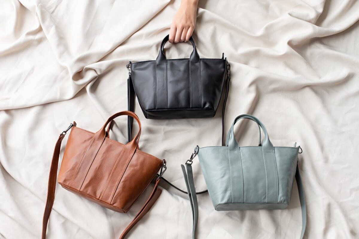 Sunset International Shipping | How to Pack Purses for Moving With Ease Tree leather purses on a white surface